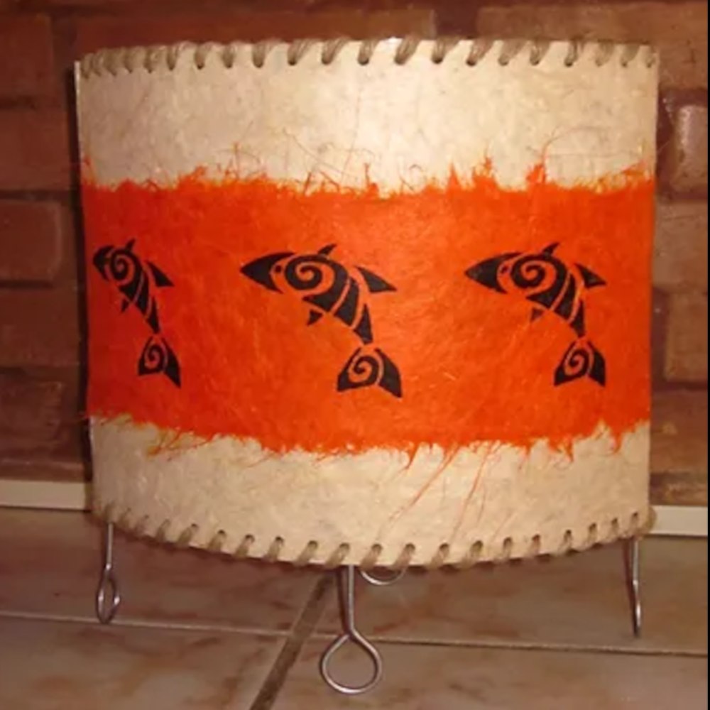 Ovalada con guarda de peces étnicos
